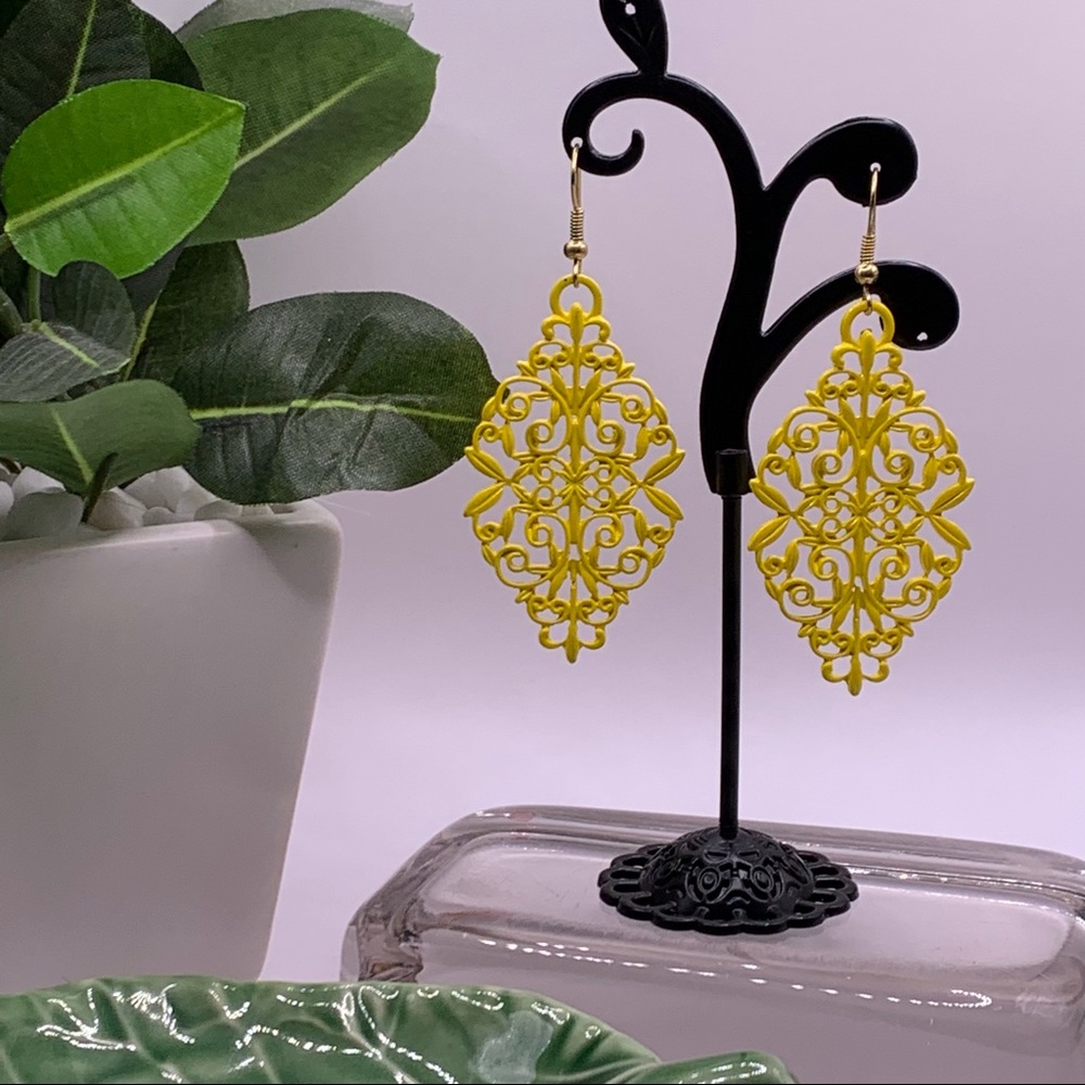 3 for $15.  Very pretty bright yellow drop pierced earrings.